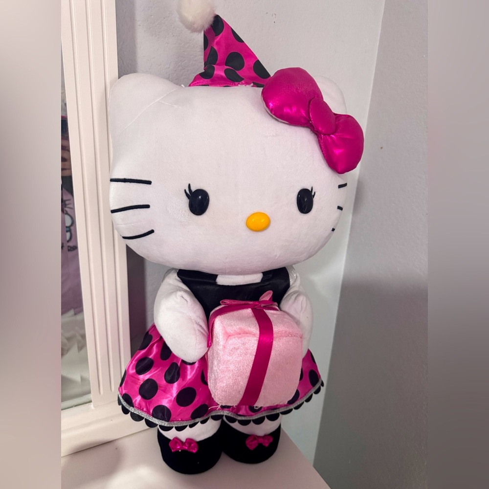 Hello Kitty Party Greeter, 28-inch, white, with a black and hot pink dress.